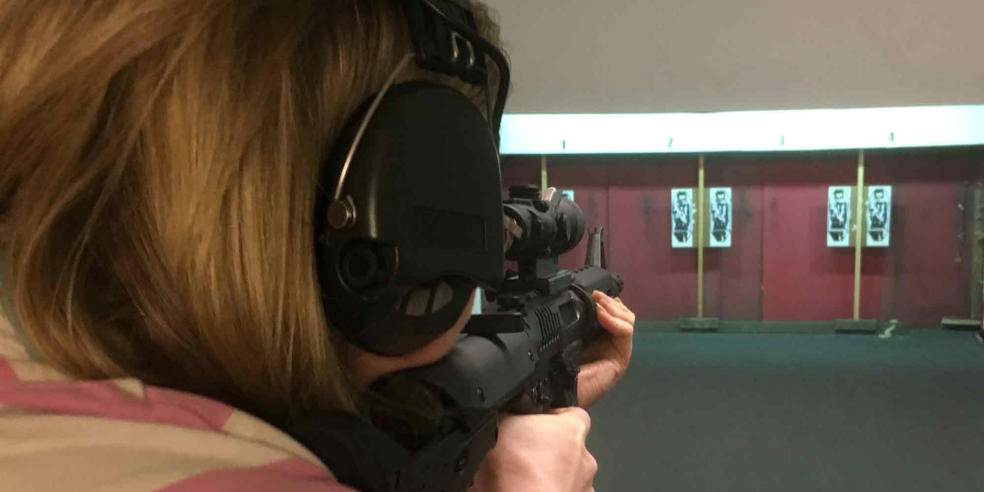 Taking aim with a rifle at a target at NE Lincs Target Club