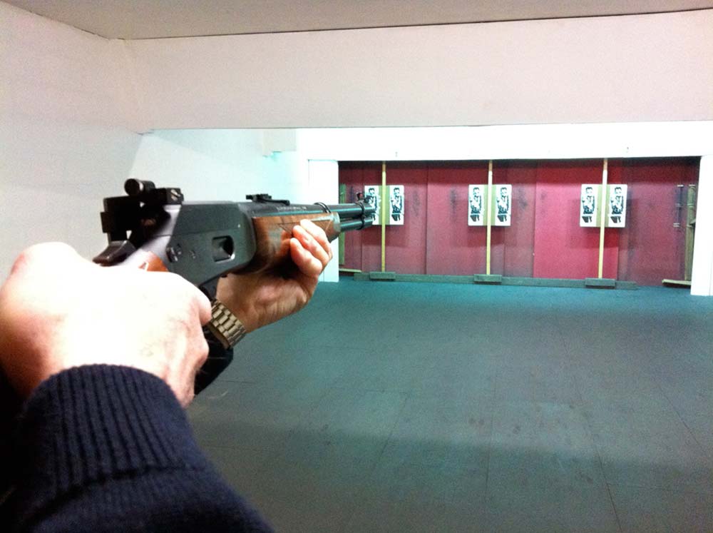 Taking aim with a shotgun at a target at NE Lincs Target Club